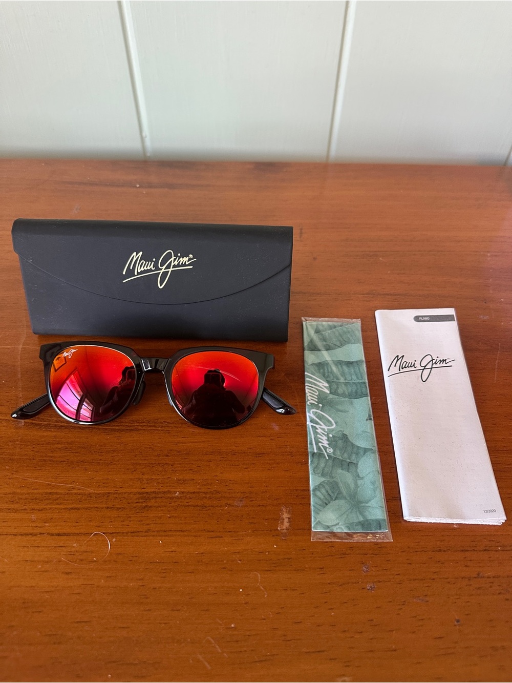Maui Jim Black Frame Sunglasses with Red Mirrored Lenses